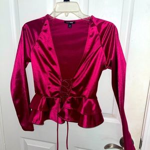 Fashion nova metallic pink top with straps. Never worn. In perfect condition.